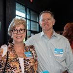 Habitat Greensboro Blueprints and Bubbly sponsors Ginger and Steve Walton smile at the camera