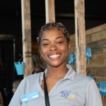 Greensboro Habitat stakeholder Zakhia smiles at 2023's Blueprints and Bubbly