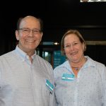 Habitat Greensboro stakeholders Chip Hagan and Ross Harris smile at Blueprints and Bubbly of 2023