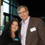 Habitat Greensboro CEO David Koloseike poses alongside his wife Mary Ann