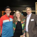 Habitat Greensboro's CEO David Koloseike smiles with stakeholders Brett and Cindy