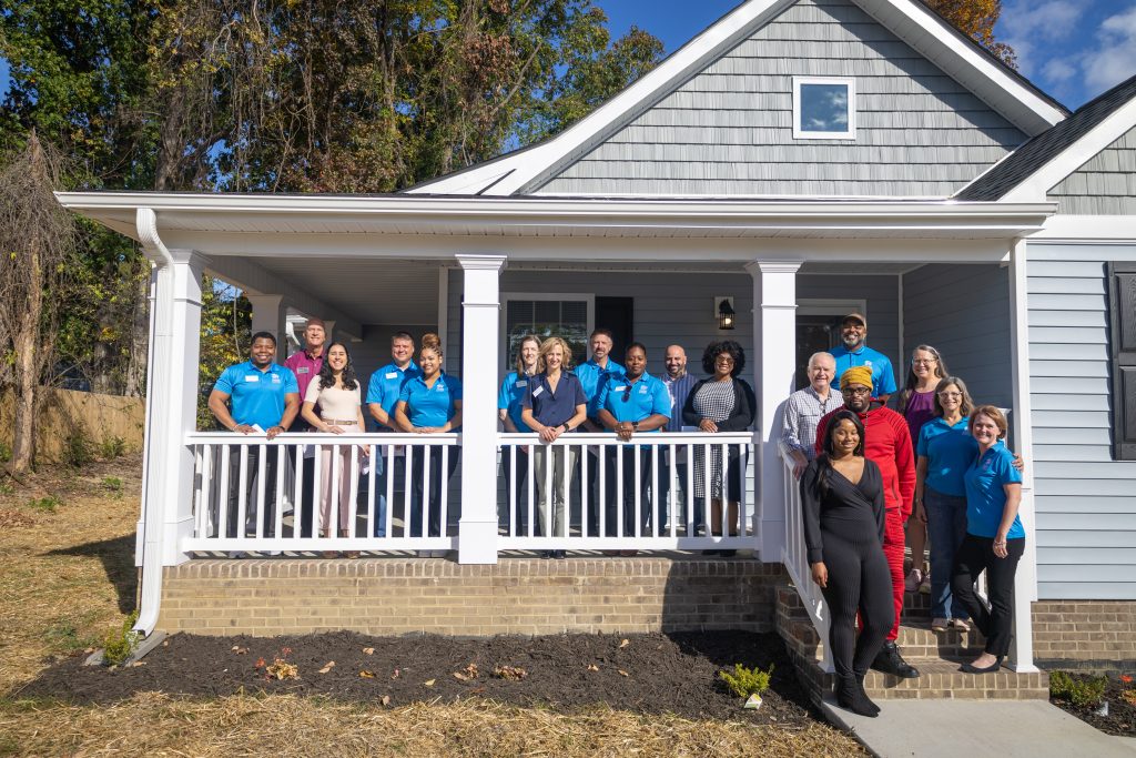 Machalla and the Habitat Greensboro team at her dedication